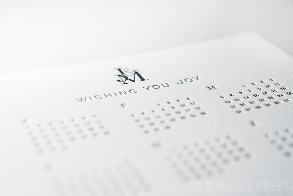 image of letterpress printed calendar holiday wishing you joy