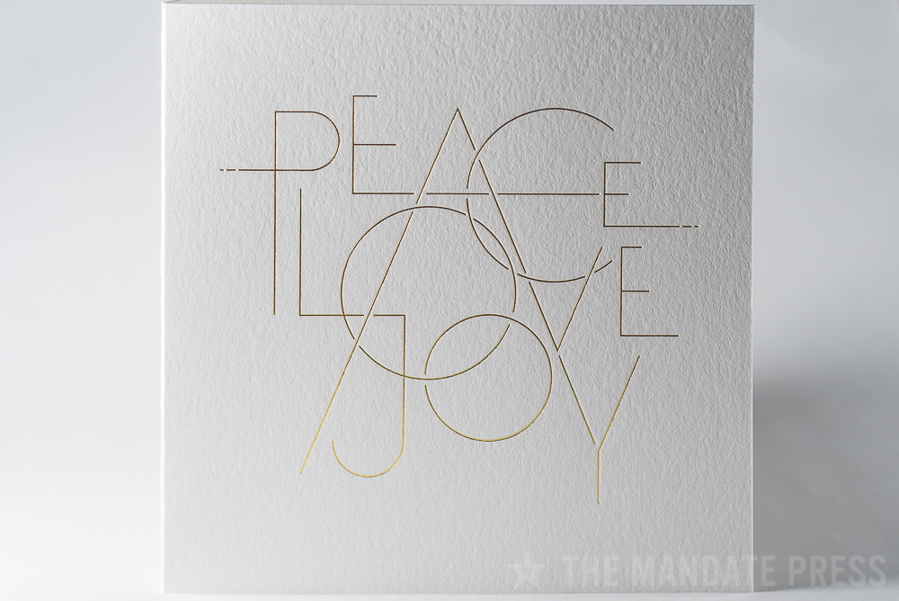 image of letterpress printed holiday card with gold foil