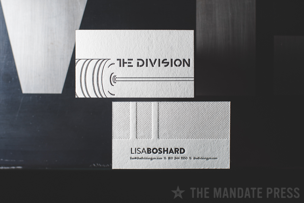 image of letterpress business card for The Division Gym with blind deboss