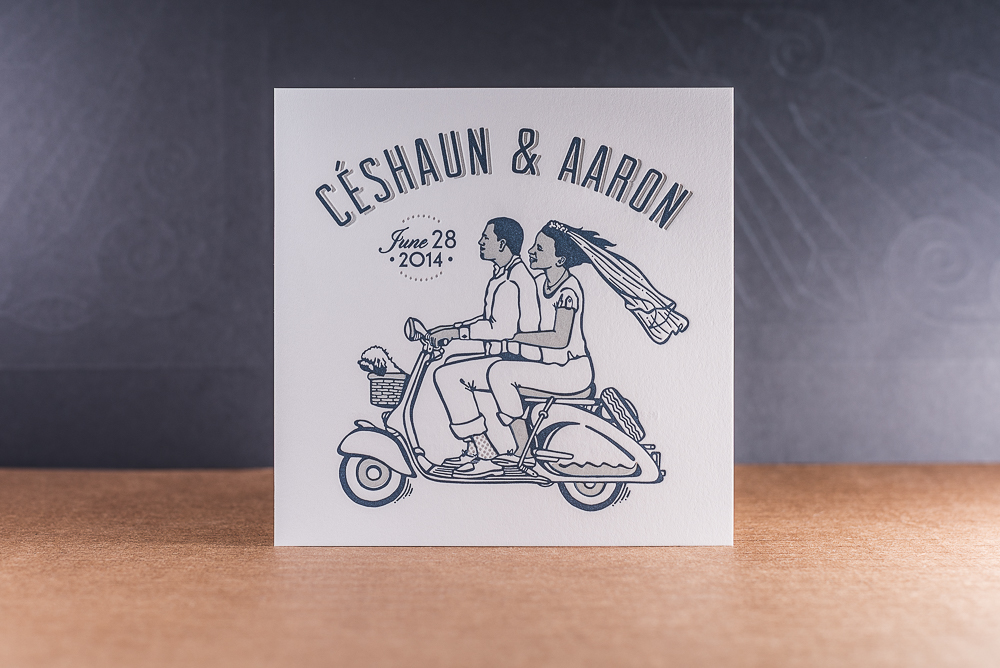 letterpress printed two color wedding invite with couple on scooter