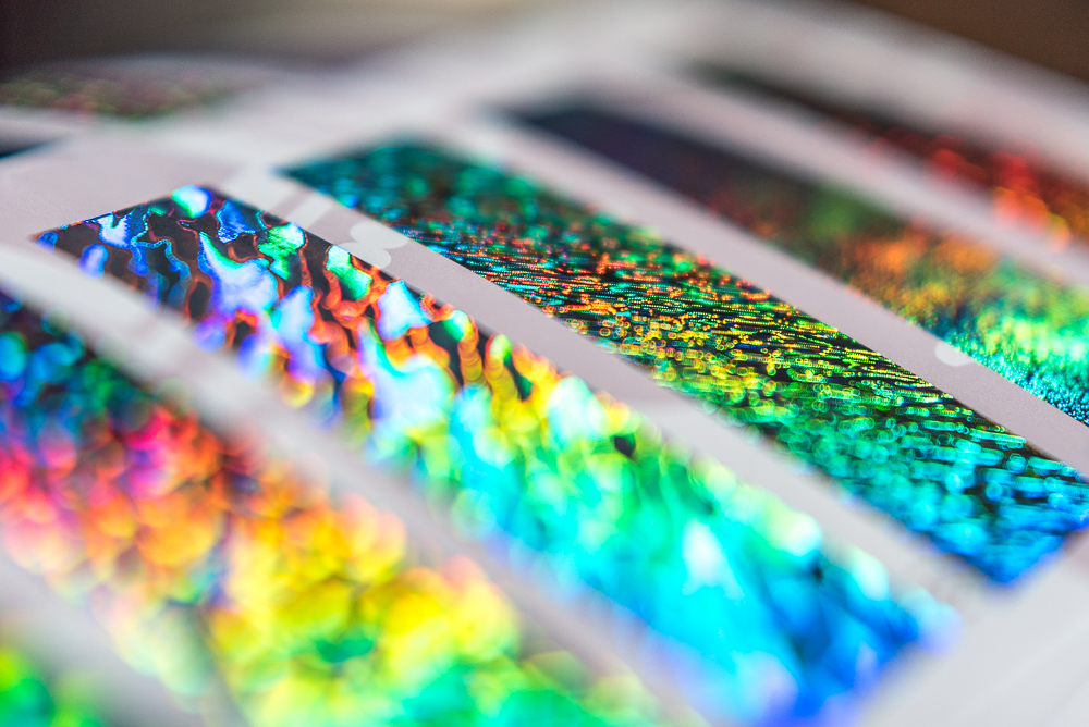 Close up picture of letterpress holographic foil sample book