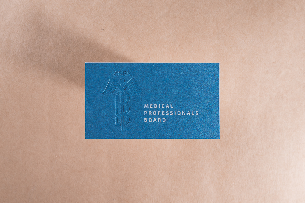 blind impression on letterpress business card blue paper