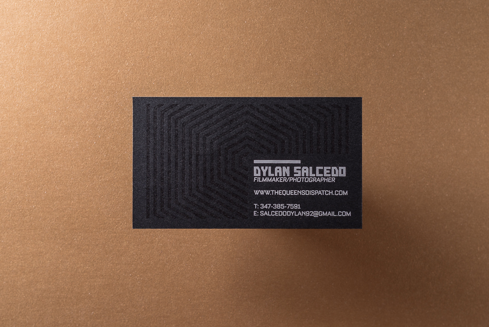 business card with white foil and varnish on black paper