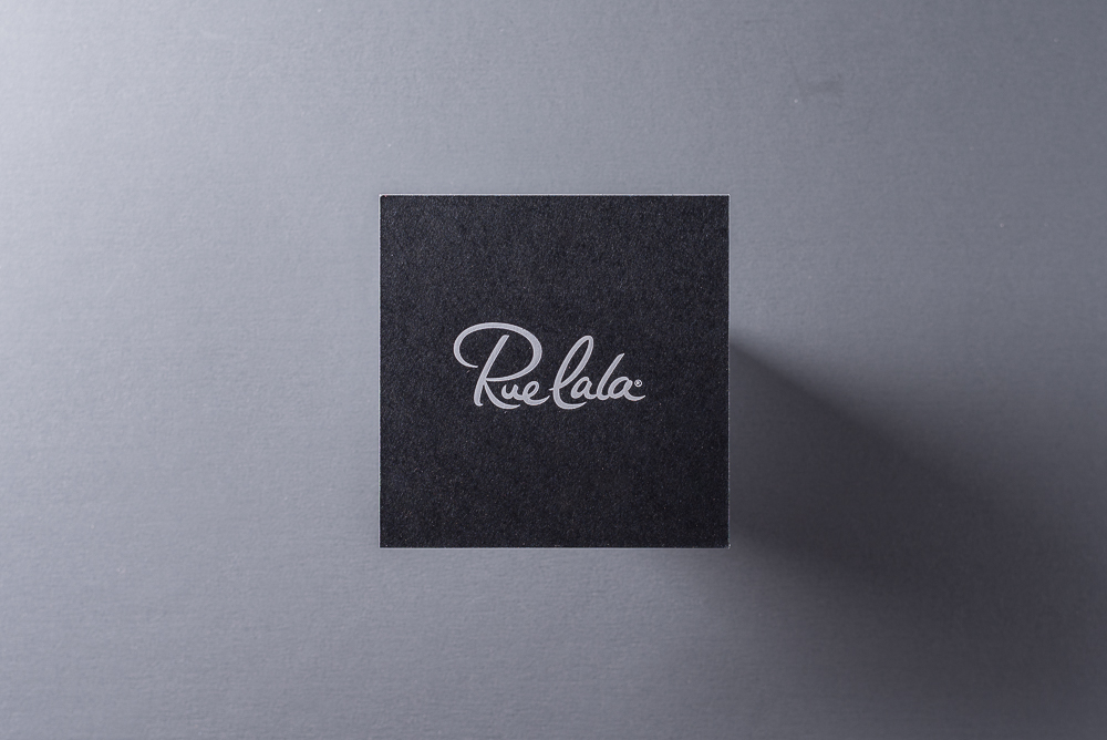 Square business card with white foil logo
