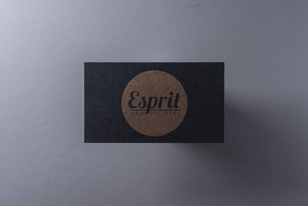 business card with gold metallic ink on black paper